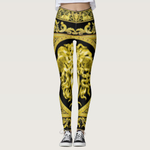 Goldene Medusa mit Arabesken über schwarzen Leggin Leggings