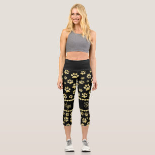 Goldene Pfotenabdrücke auf Schwarz mit individuell Capri Leggings