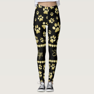 Goldene Pfotenabdrücke auf Schwarz mit individuell Leggings