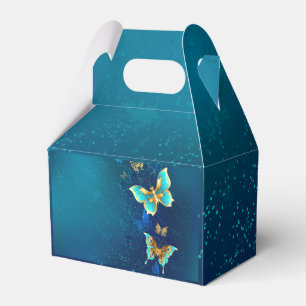 Goldene Schmetterlinge auf blauem Hintergrund Geschenkschachtel
