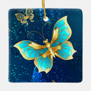 Goldene Schmetterlinge auf blauem Hintergrund Keramikornament