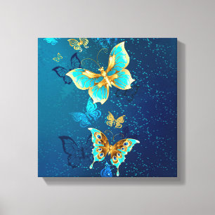 Goldene Schmetterlinge auf blauem Hintergrund Leinwanddruck