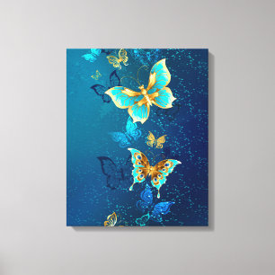 Goldene Schmetterlinge auf blauem Hintergrund Leinwanddruck