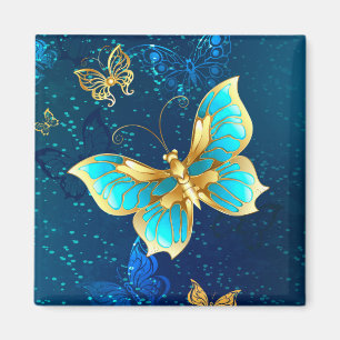 Goldene Schmetterlinge auf blauem Hintergrund Magnet