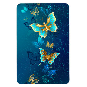 Goldene Schmetterlinge auf blauem Hintergrund Magnet