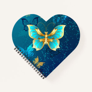 Goldene Schmetterlinge auf blauem Hintergrund Notizbuch