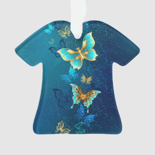 Goldene Schmetterlinge auf blauem Hintergrund Ornament
