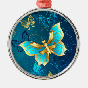 Goldene Schmetterlinge auf blauem Hintergrund Ornament Aus Metall
