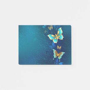 Goldene Schmetterlinge auf blauem Hintergrund Post-it Klebezettel