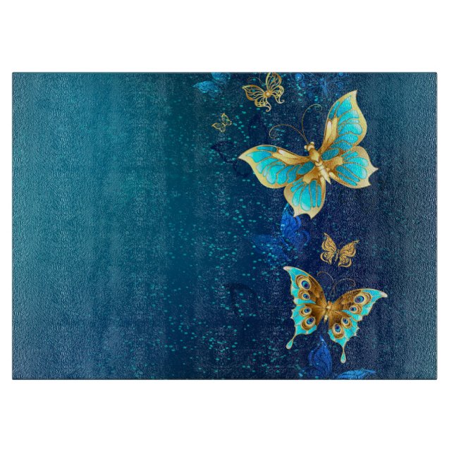 Goldene Schmetterlinge auf blauem Hintergrund Schneidebrett (Vorderseite)
