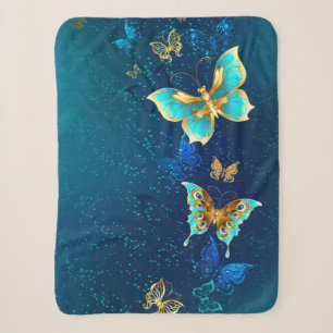 Goldene Schmetterlinge auf blauem Hintergrund Sherpadecke