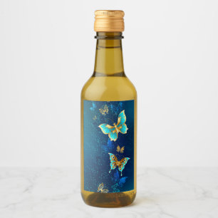 Goldene Schmetterlinge auf blauem Hintergrund Weinetikett
