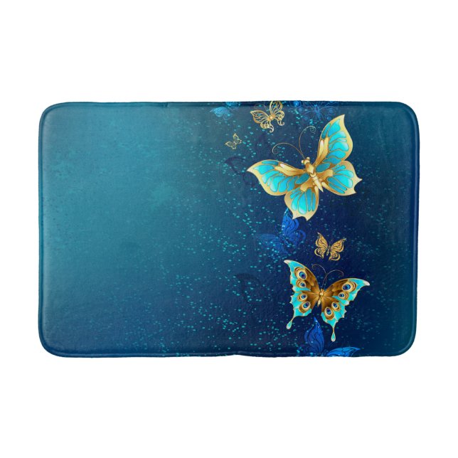 Goldene Schmetterlinge auf einem blauen Hintergrun Badematte (Vorderseite)