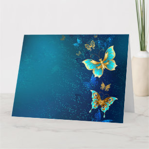 Goldene Schmetterlinge auf einem blauen Hintergrun Dankeskarte