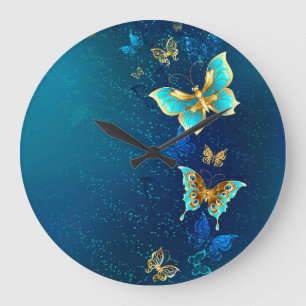 Goldene Schmetterlinge auf einem blauen Hintergrun Große Wanduhr