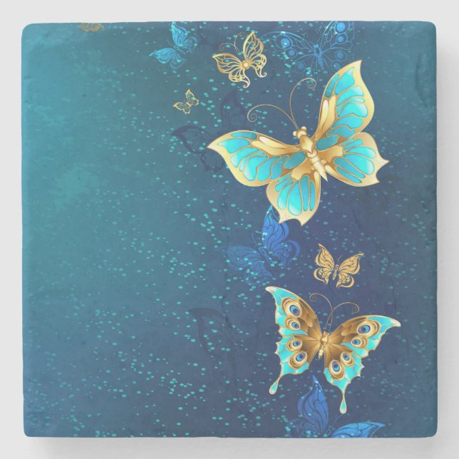 Goldene Schmetterlinge auf einem blauen Hintergrun Steinuntersetzer (Vorderseite)