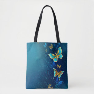 Goldene Schmetterlinge auf einem blauen Hintergrun Tasche