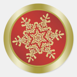 Goldene Schneeflocke auf rotem Weihnachten Runder Aufkleber
