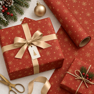 Goldene Schneeflocken auf optionalem dunklem Rot I Geschenkpapier