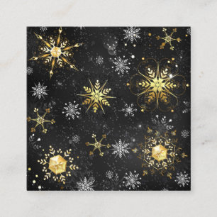 Goldene Schneeflocken auf schwarzem Hintergrund Begleitkarte