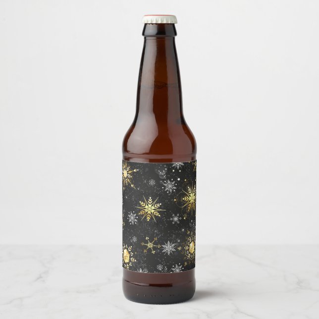 Goldene Schneeflocken auf schwarzem Hintergrund Bierflaschenetikett (Vorderseite)