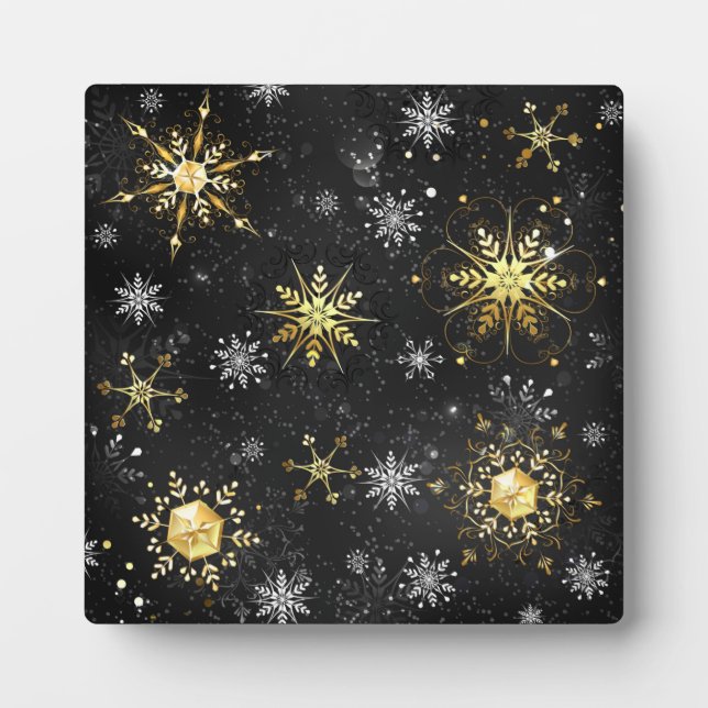 Goldene Schneeflocken auf schwarzem Hintergrund Fotoplatte (Vorderseite)
