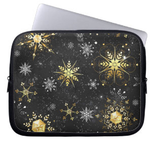 Goldene Schneeflocken auf schwarzem Hintergrund Laptopschutzhülle
