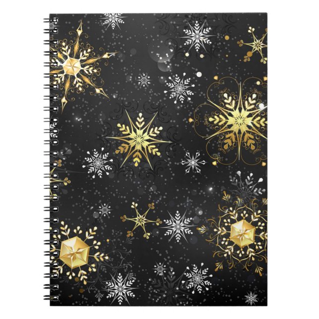 Goldene Schneeflocken auf schwarzem Hintergrund Notizblock (Vorderseite)