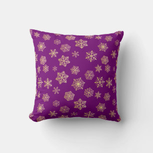 Goldene Schneeflocken auf violettem Hintergrund Kissen