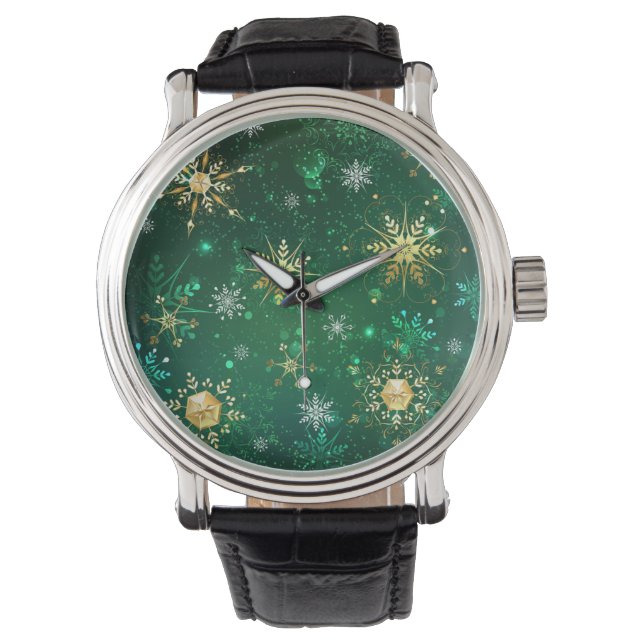 Goldene Schneeflocken im grünen Hintergrund Armbanduhr (Vorderseite)