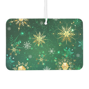 Goldene Schneeflocken im grünen Hintergrund Autolufterfrischer