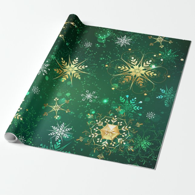 Goldene Schneeflocken im grünen Hintergrund Geschenkpapier (Ungerollt)