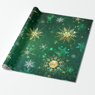Goldene Schneeflocken im grünen Hintergrund Geschenkpapier