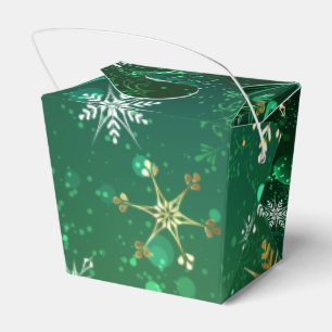 Goldene Schneeflocken im grünen Hintergrund Geschenkschachtel