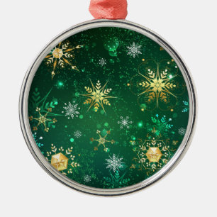 Goldene Schneeflocken im grünen Hintergrund Ornament Aus Metall