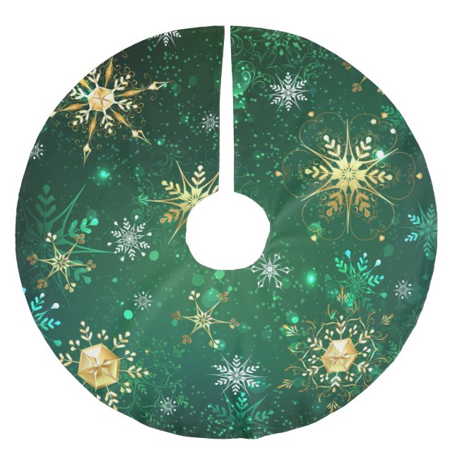 Goldene Schneeflocken im grünen Hintergrund Polyester Weihnachtsbaumdecke (Vorderseite)
