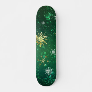 Goldene Schneeflocken im grünen Hintergrund Skateboard