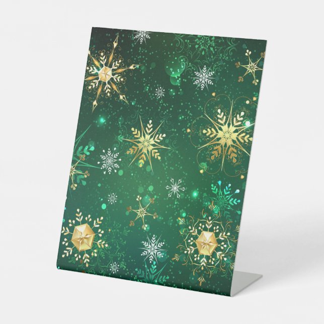 Goldene Schneeflocken im grünen Hintergrund Sockelschild (Vorderseite)