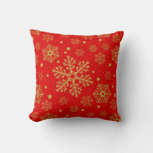 Goldene Schneeflocken in Rot Kissen