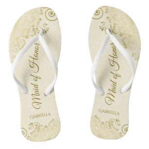 Goldene Spitzen auf Hochzeit der Elfenbeincreme-Tr Flip Flops