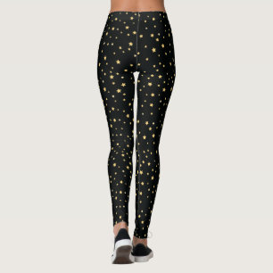 Goldene Sternchen-Vereinbarung auf Schwarzem Leggings