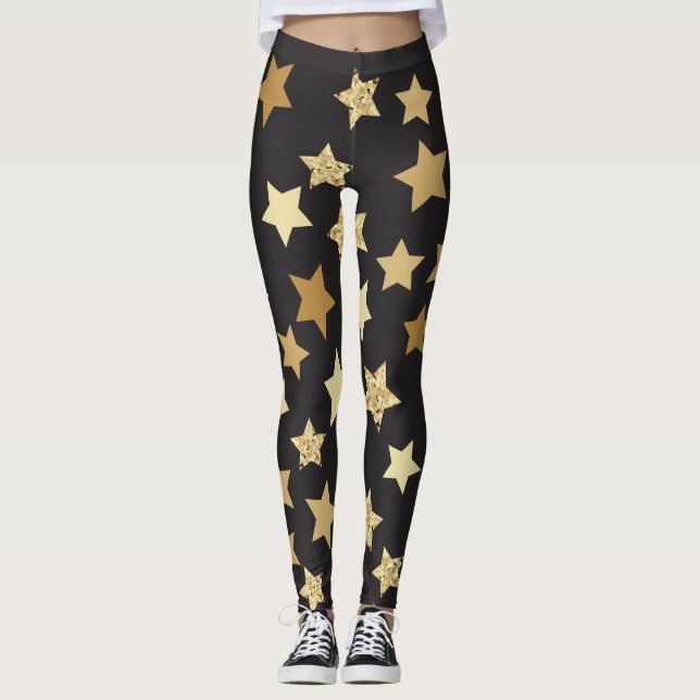 Goldene Sterne auf schwarzem Hintergrund Leggings (Vorderseite)