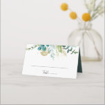 Goldene tropische Platzkarte Hochzeitsfeier<br><div class="desc">Diese Platzkarte mit goldblühenden tropischen Pflanzen ist perfekt für eine Hochzeit in Urlaubsort. Das Design zeichnet sich vor allem durch handbemaltes grünes Blattwerk in Aquarell und goldene Blume aus. Personalisieren Sie die Rückseite der Platzkarte mit den Namen der Braut und Bräutigam und dem Datum.</div>