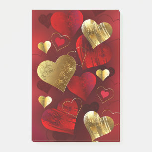 Goldene und rote Valentine Post-it Klebezettel