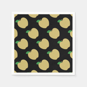 Goldener Apfel auf schwarz Serviette