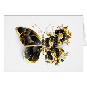 Goldener Schmetterling mit schwarzem Orchid