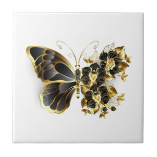 Goldener Schmetterling mit schwarzem Orchid Fliese