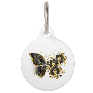 Goldener Schmetterling mit schwarzem Orchid Haustiermarke