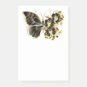 Goldener Schmetterling mit schwarzem Orchid Post-it Klebezettel