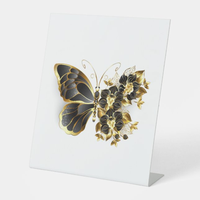 Goldener Schmetterling mit schwarzem Orchid Sockelschild (Vorderseite)